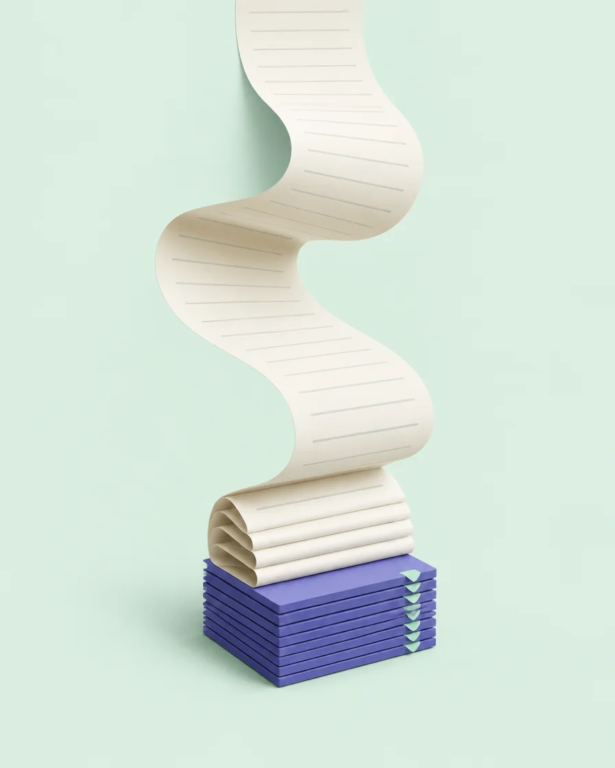A long ribbon of paper folding itself into a neat stack.